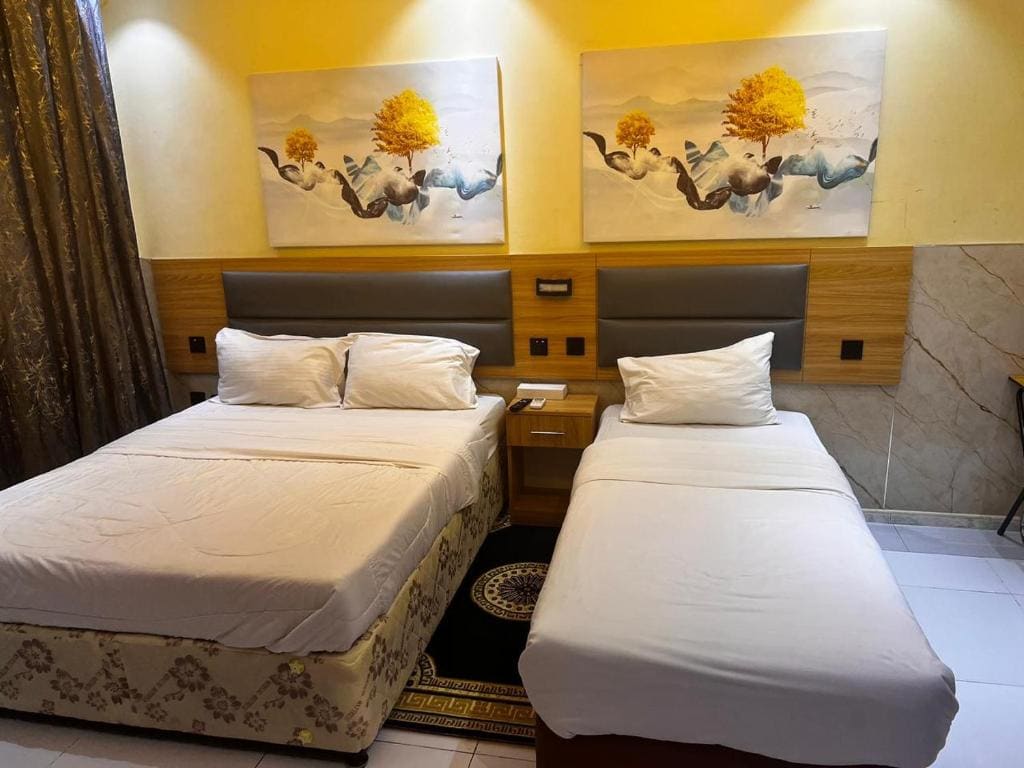 Deluxe Double Room (2 Adults + 1 Child) room - Image 1