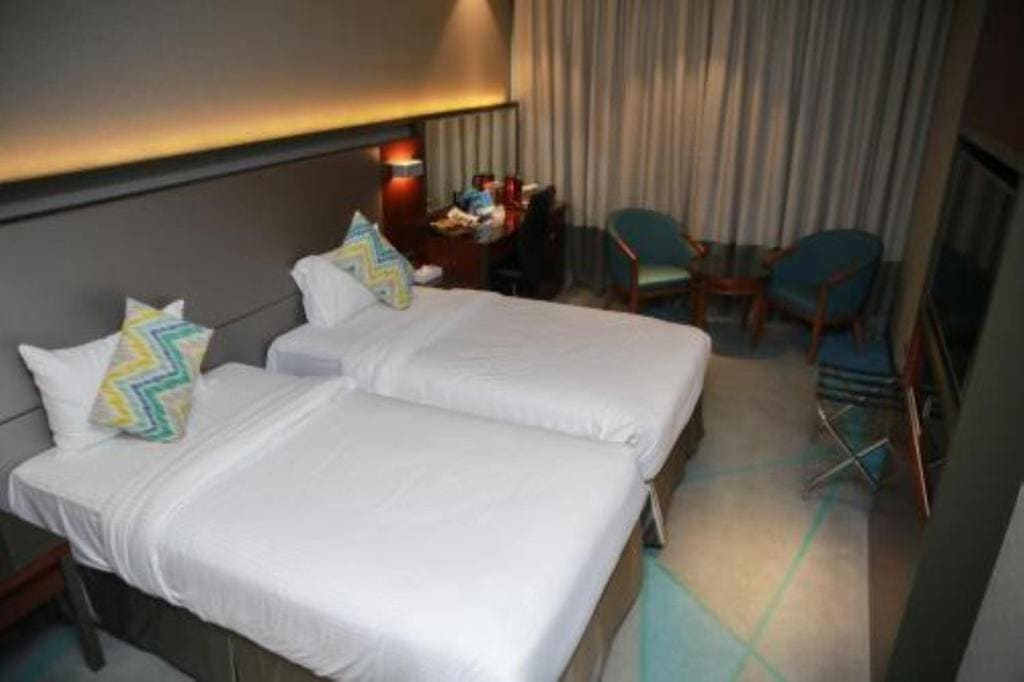 Deluxe Double Room (2 Adults + 1 Child) room - Image 3