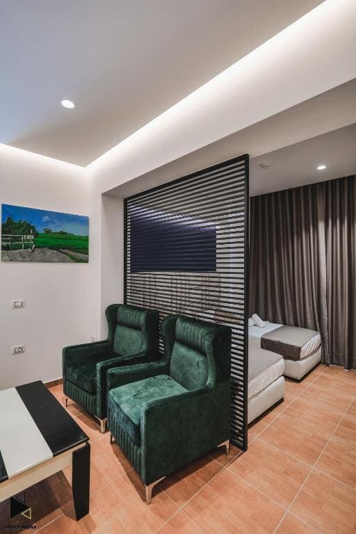 Deluxe Quadruple Room room - Image 1