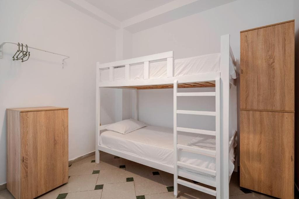 Basic Triple Room with Shared Bathroom room - Image 1
