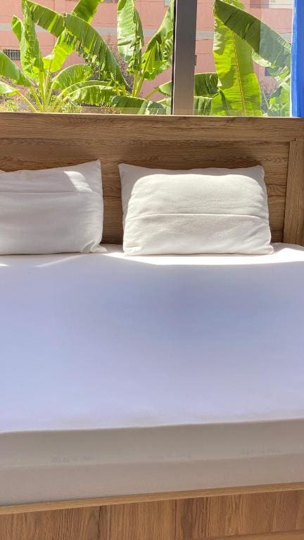 Economy Triple Room with Shared Bathroom room - Image 2
