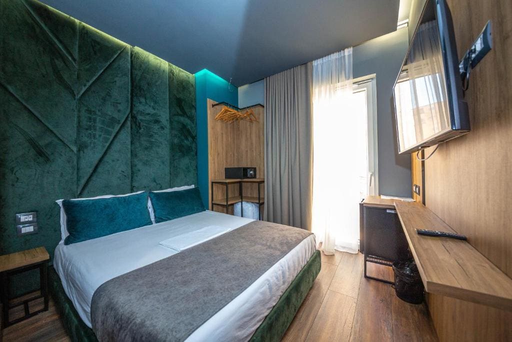 Standard Deluxe Double Room with Side Sea View room - Image 1