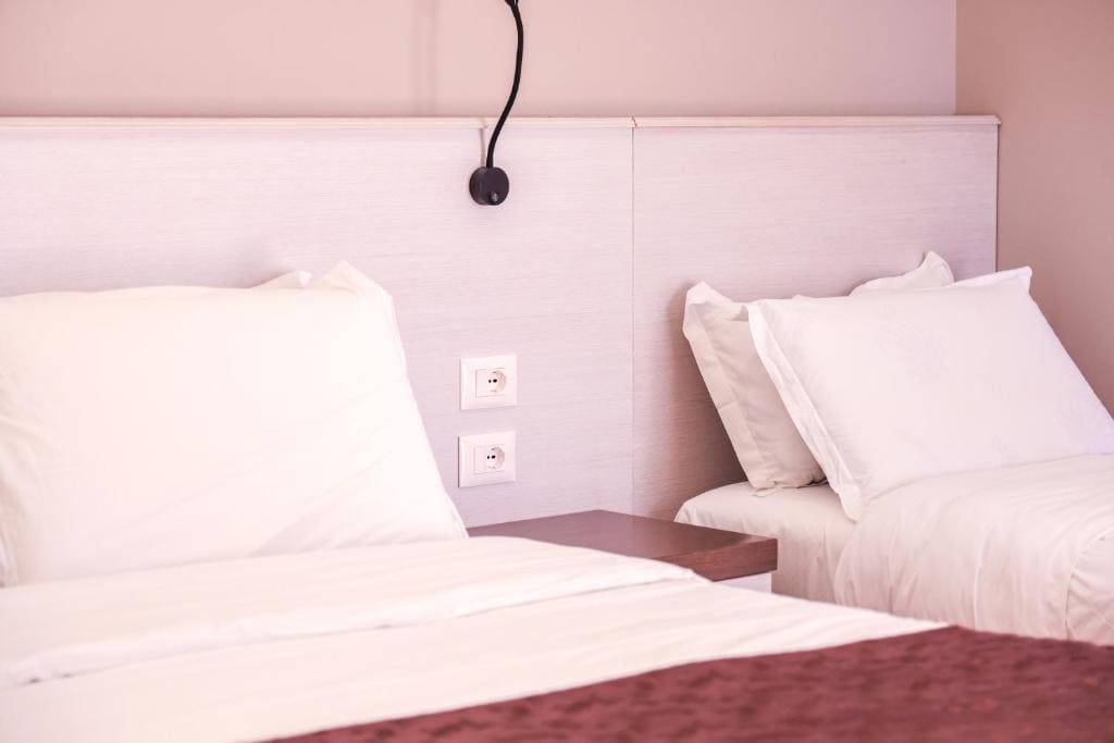Superior Triple Room with Balcony and Side Sea View room - Image 2