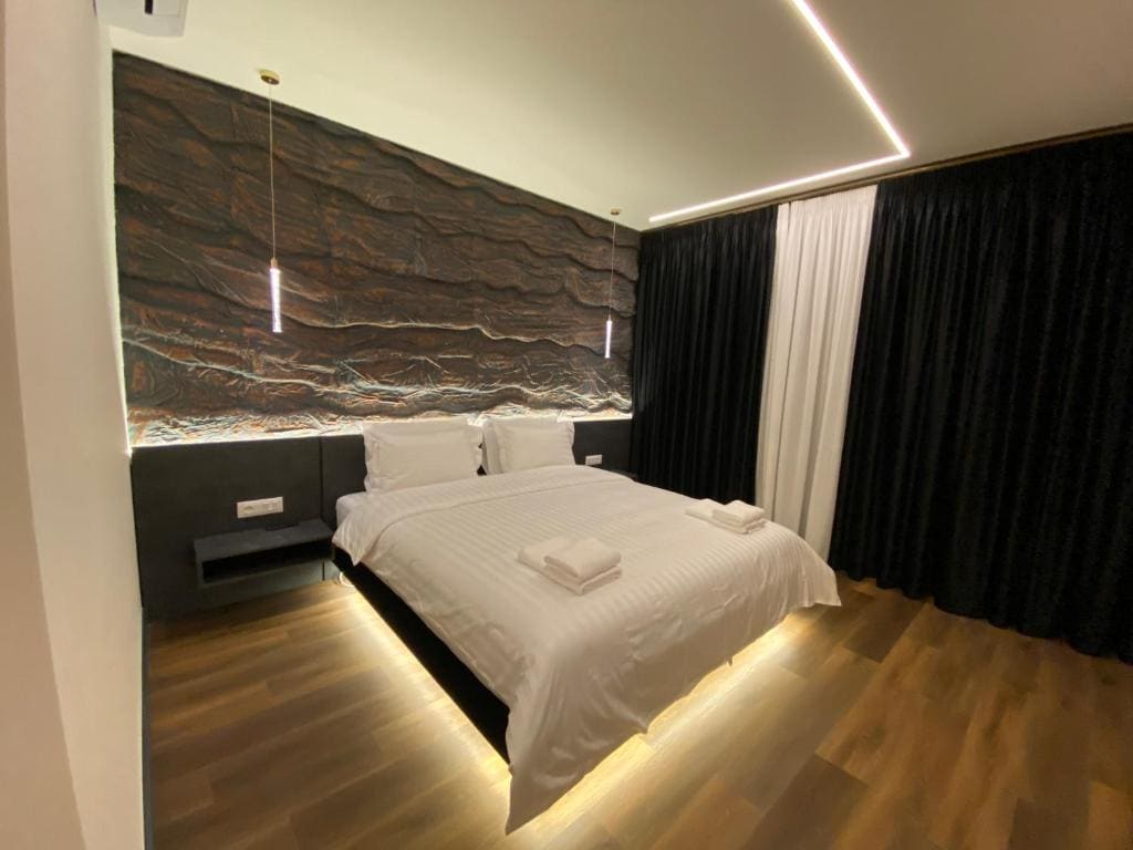 Deluxe Quadruple Room room - Image 1