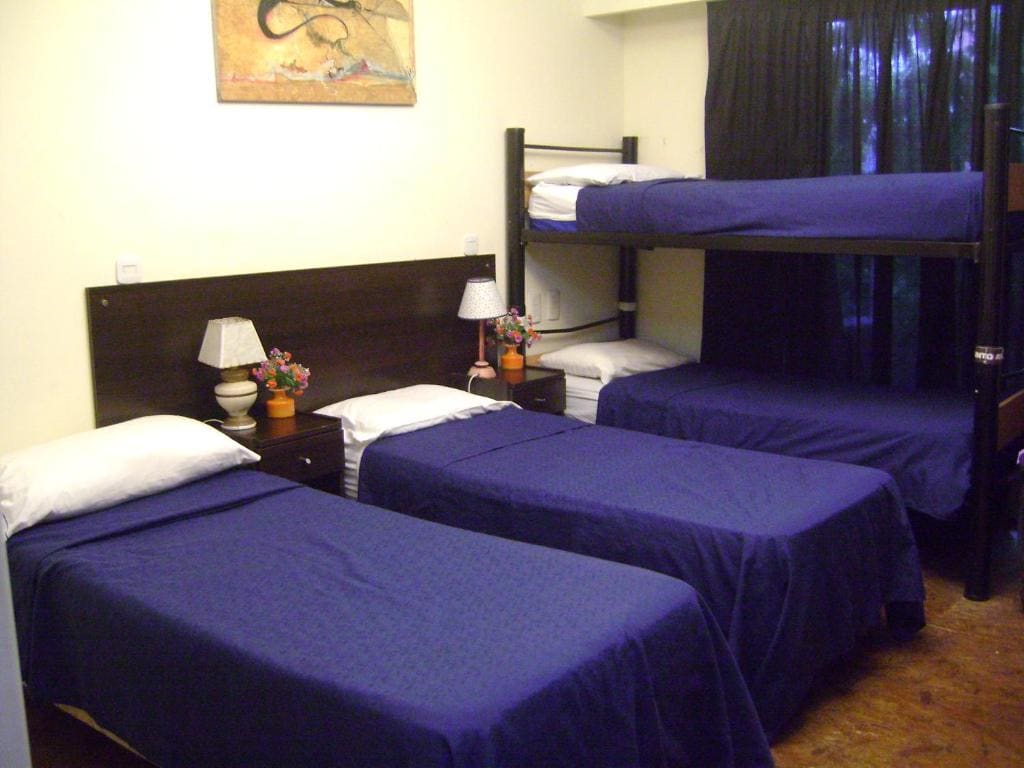 Quadruple Room with Private Bathroom room - Image 1