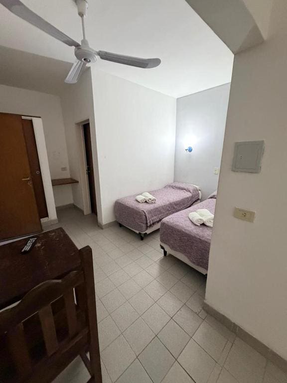 Quadruple Room with Private Bathroom room - Image 1