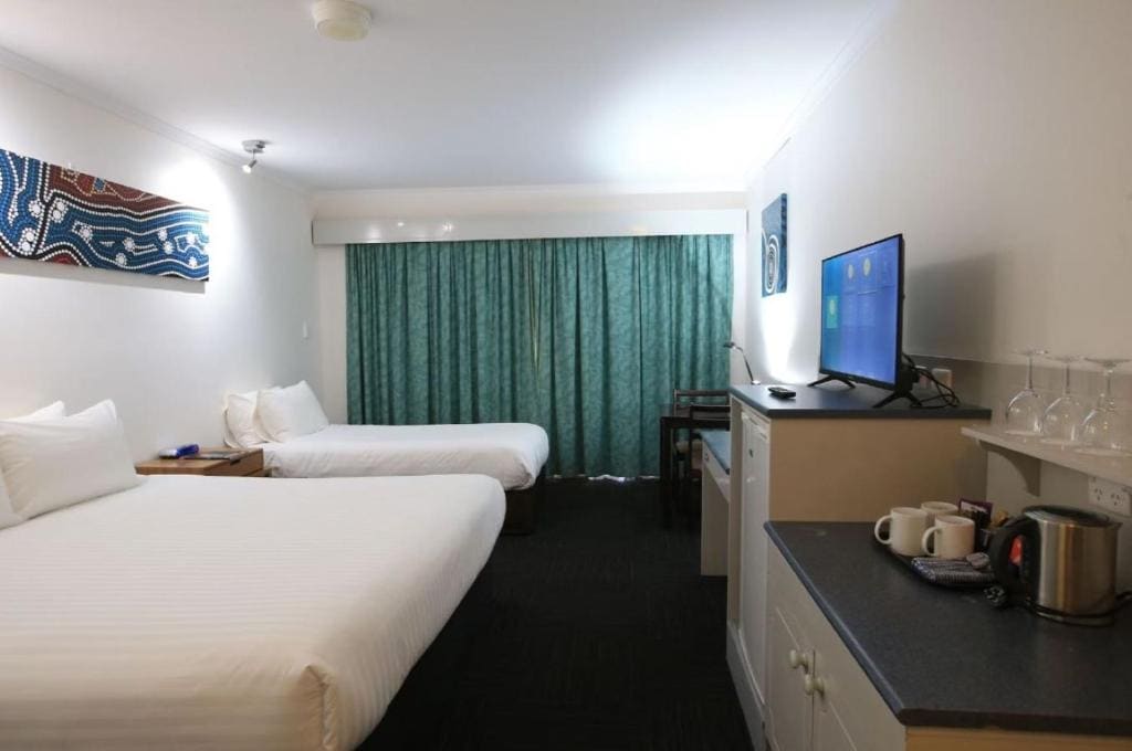 Standard Room with One Double Bed and One Single Bed room - Image 1