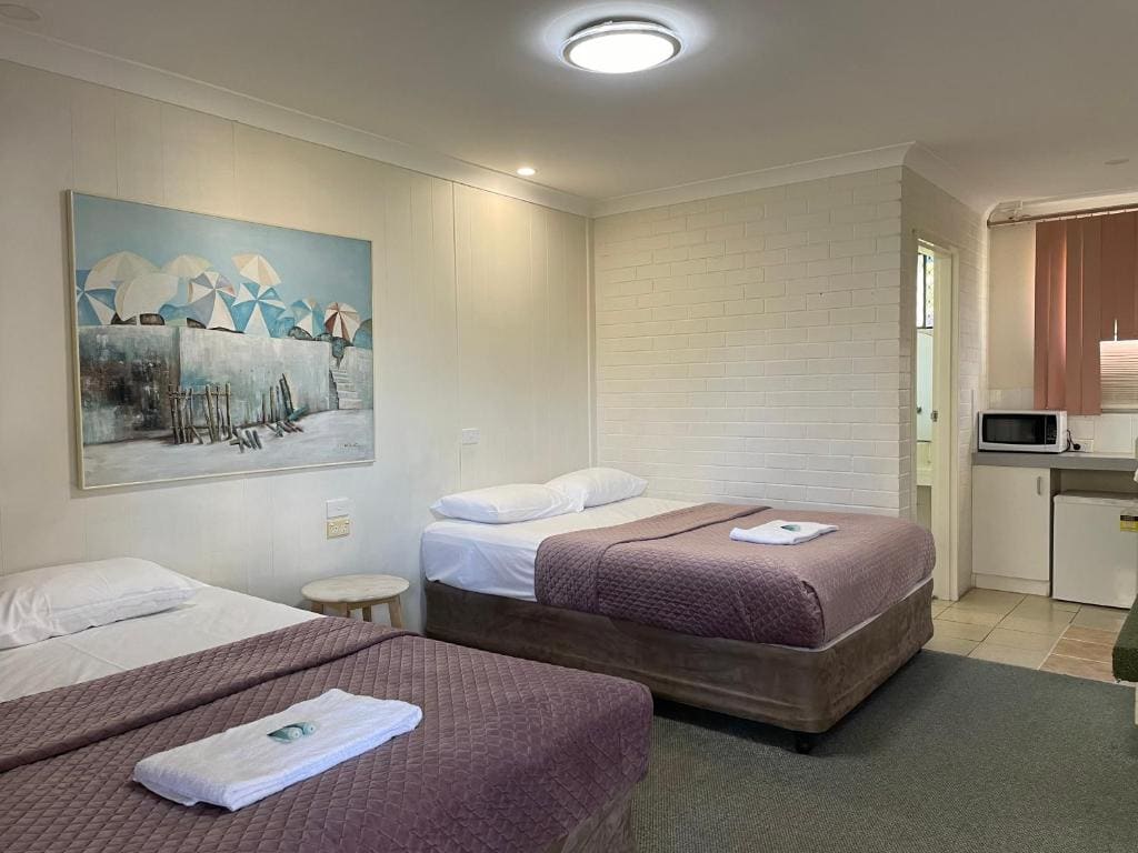 Standard Queen Room with Two Queen Beds room - Image 2