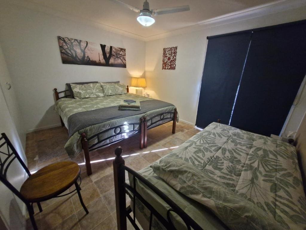 Queen Room with Shared Bathroom room - Image 1