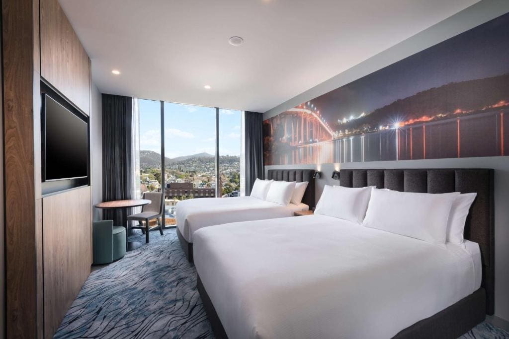 Deluxe Queen Room with Two Queen Beds room - Image 1