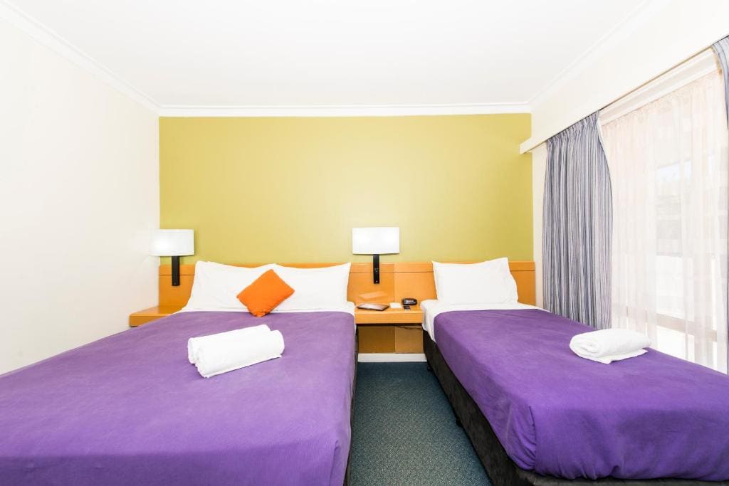 Standard Room with One Queen Bed and One Single Bed room - Image 2