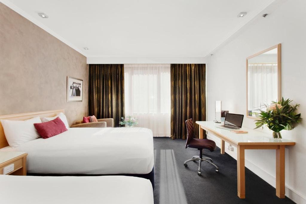 Premium Queen Room with Two Queen Beds room - Image 2
