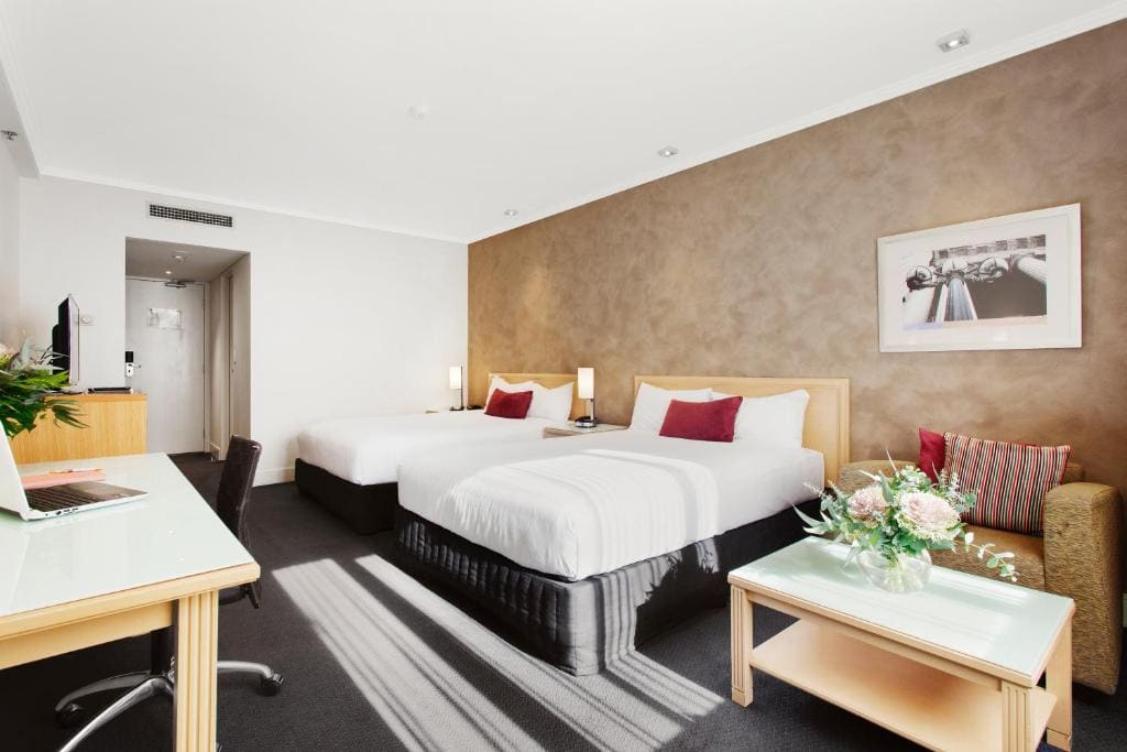 Premium Queen Room with Two Queen Beds room - Image 3