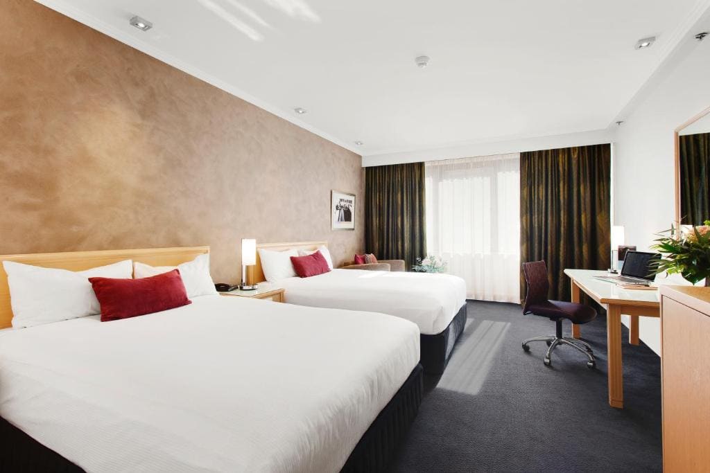 Premium Queen Room with Two Queen Beds room - Image 1