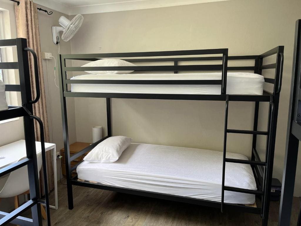 Bed in Male Dormitory Room room - Image 1