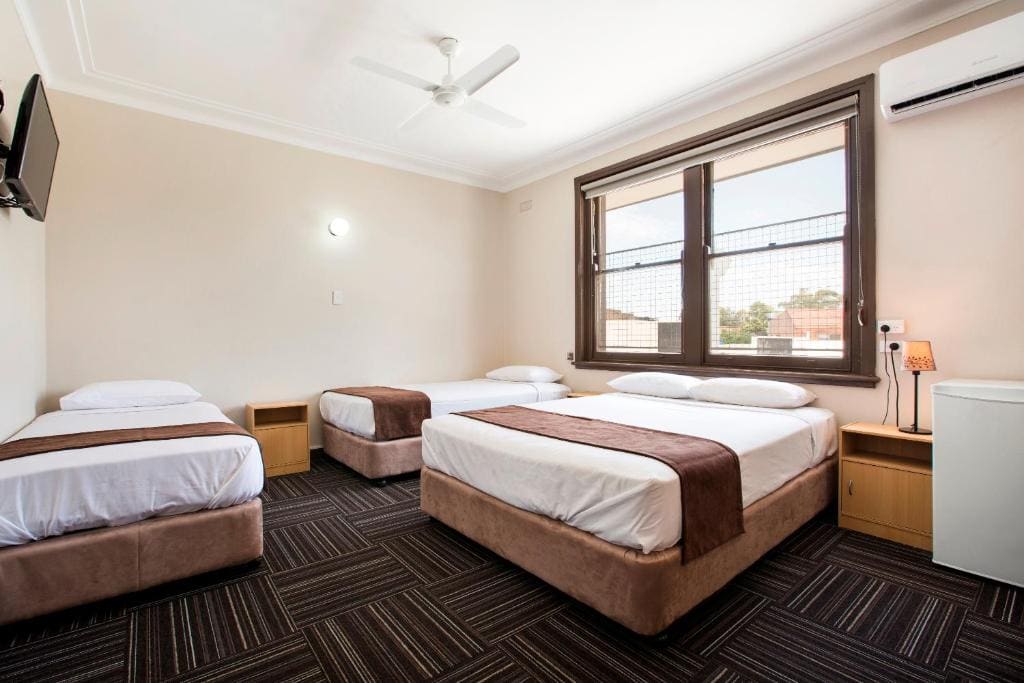 Economy Family Room with Shared Bathroom room - Image 1