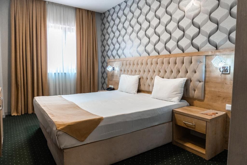 Deluxe Quadruple Room room - Image 1