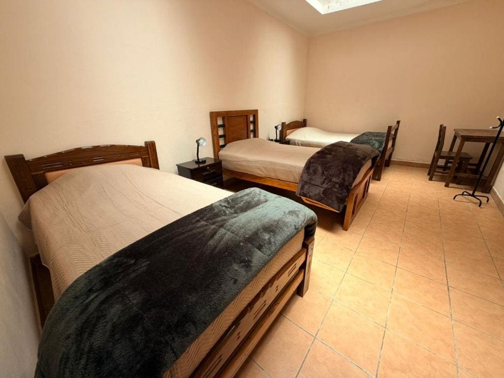Triple Room with Shared Bathroom room - Image 1