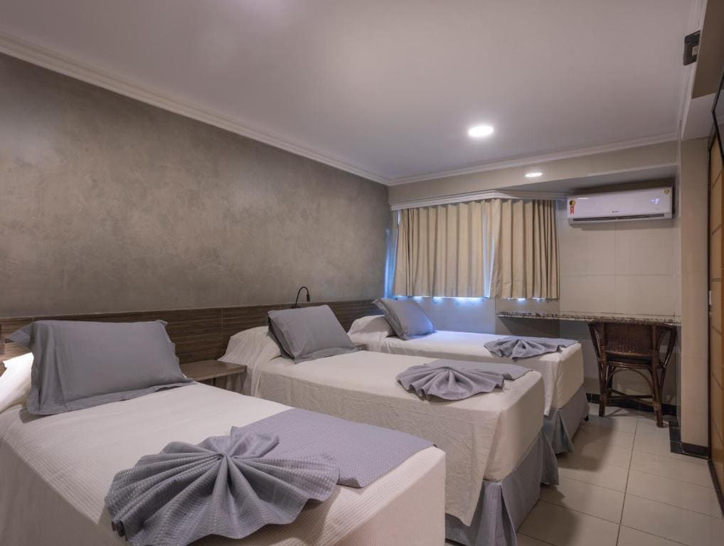 Superior Triple Room with Side Sea View room - Image 1