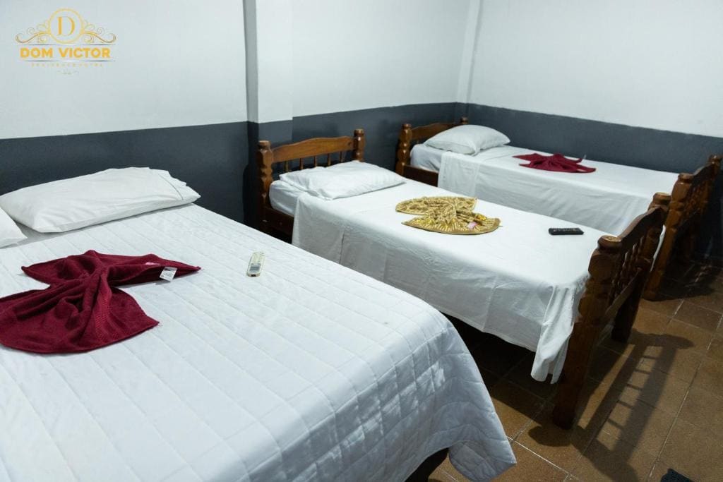 Quadruple Room with Private Bathroom room - Image 1