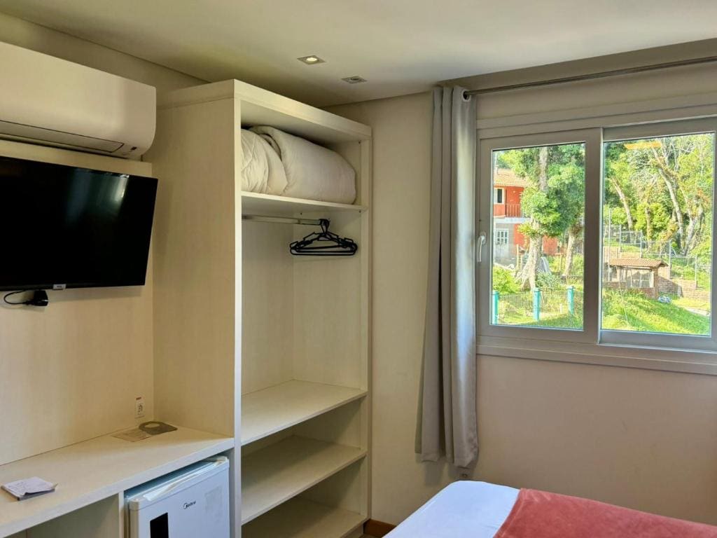 Luxo Triplo Térreo room - Image 3