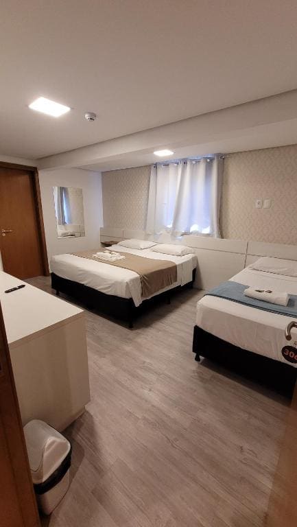 Luxo Superior Triplo room - Image 2