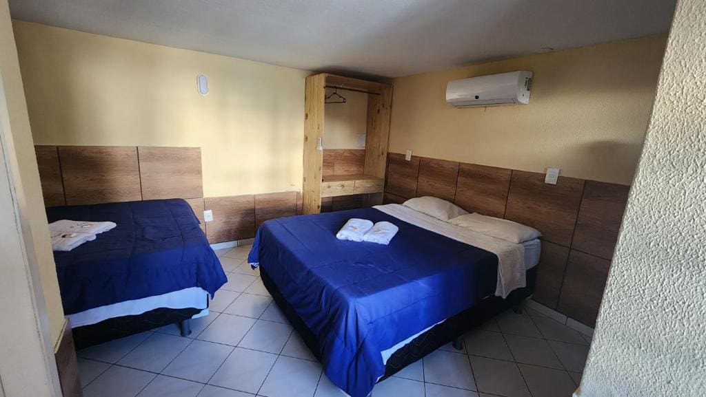 Standard Queen Room with Two Queen Beds room - Image 1
