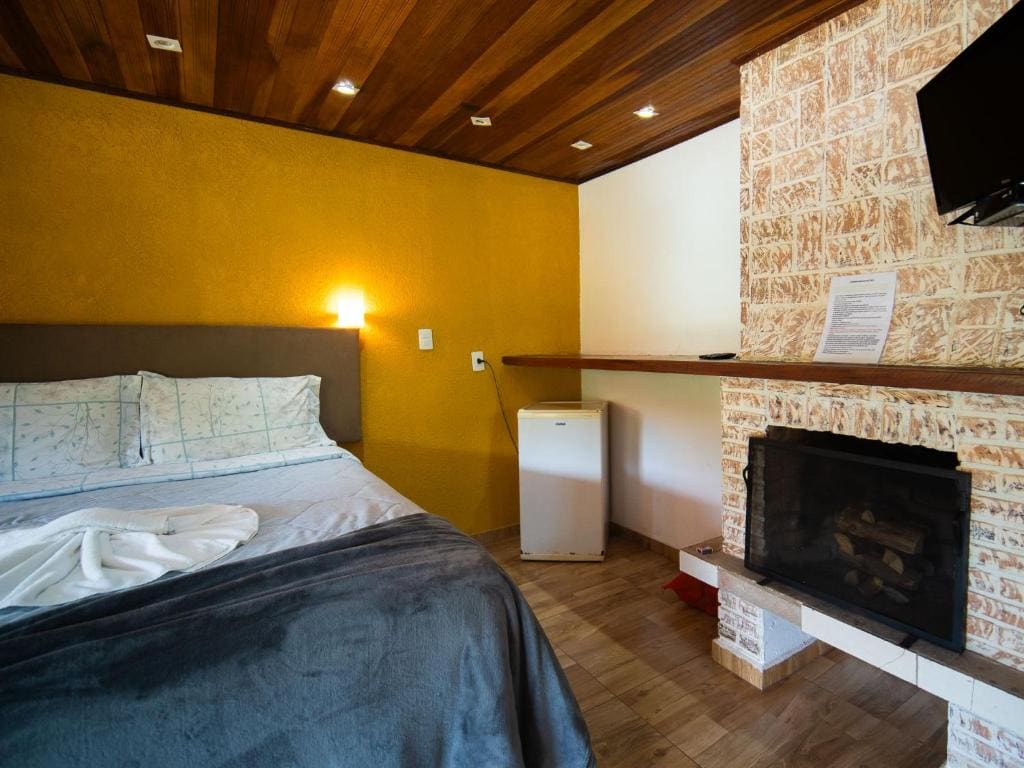 Chalé Deluxe com Varanda e Hidromassagem room - Image 2