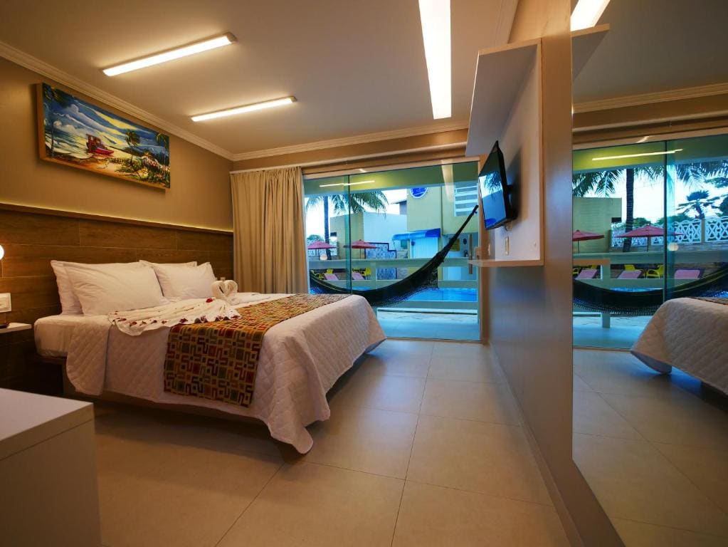 Master Casal com Varanda - Vista Piscina room - Image 3