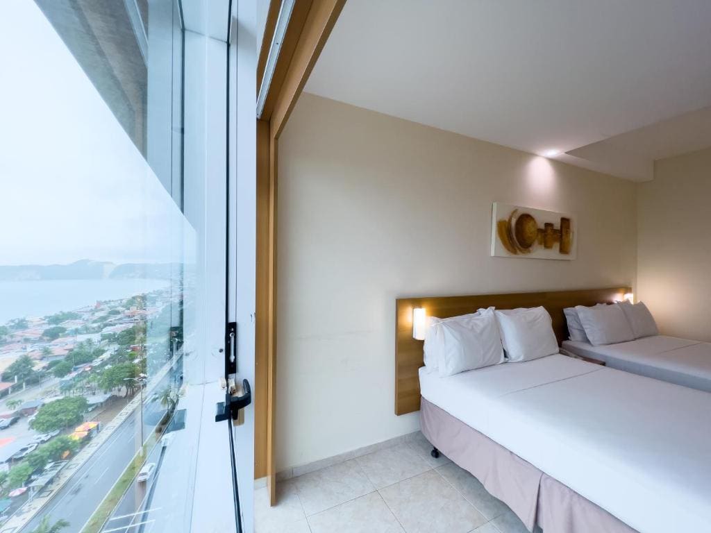 Superior Room with Two Double Beds and Sea View room - Image 3