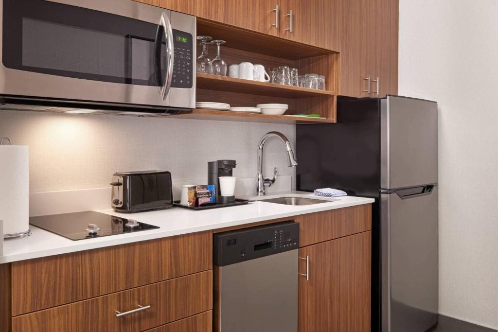 Larger One-Bedroom King Suite with Kitchenette and Sofa Bed room - Image 2