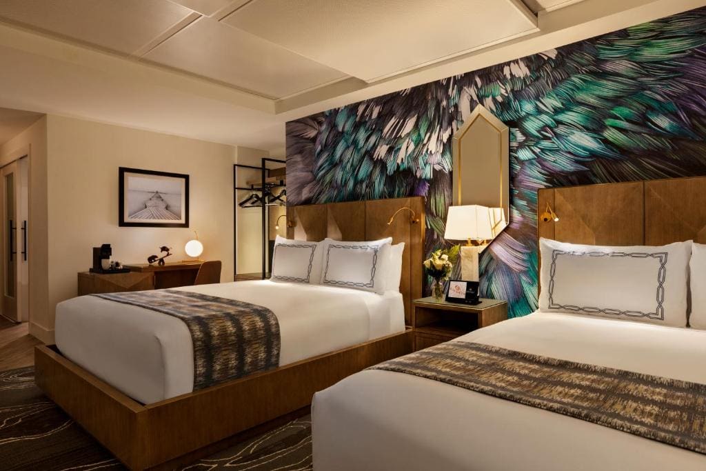 Deluxe Queen Room with Two Queen Beds room - Image 1