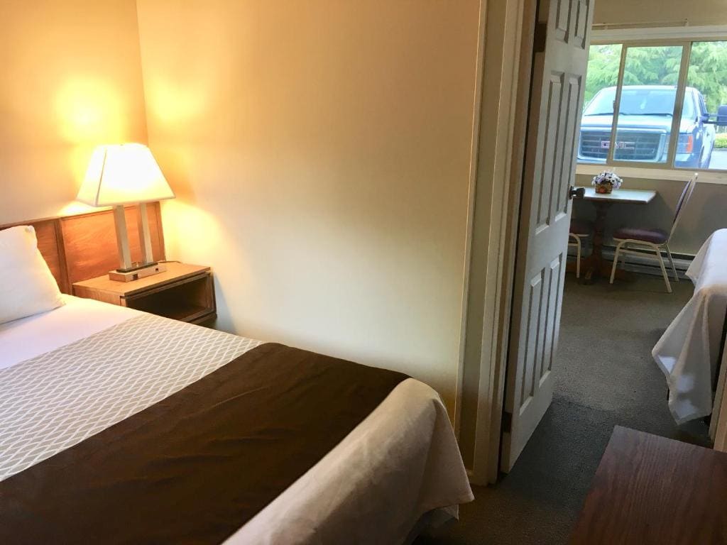Deluxe Queen Room with Two Queen Beds room - Image 3