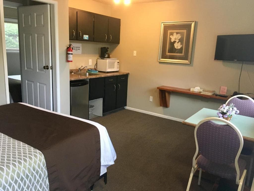 Deluxe Queen Room with Two Queen Beds room - Image 1