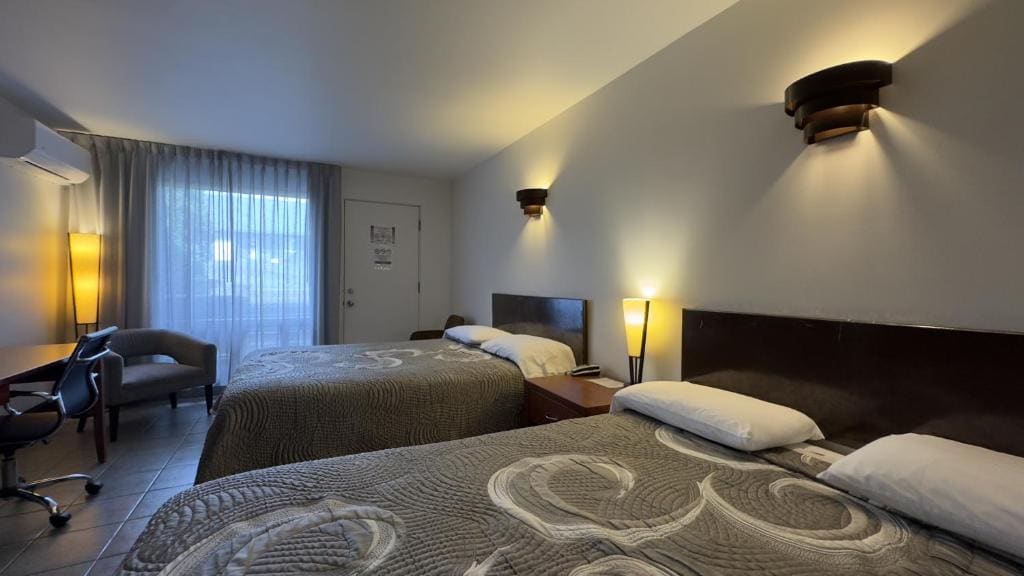 Standard Queen Room with Two Queen Beds room - Image 1