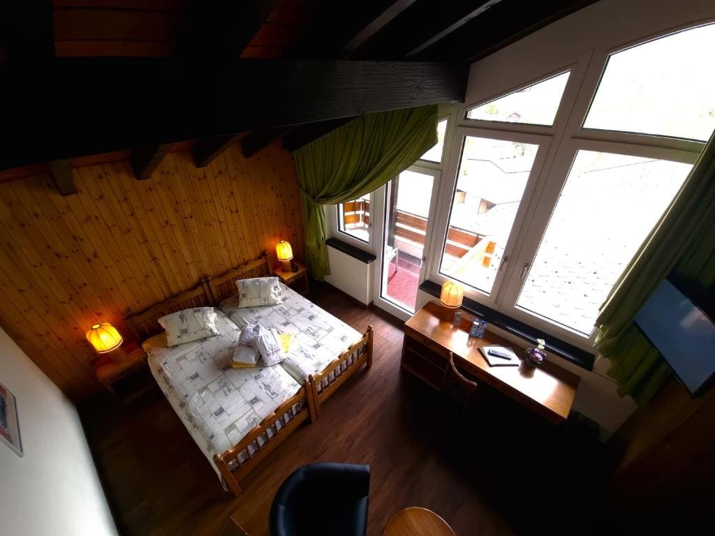 Panorama Quadruple Room with Balcony, Spa Access and Cable Car Use room - Image 1