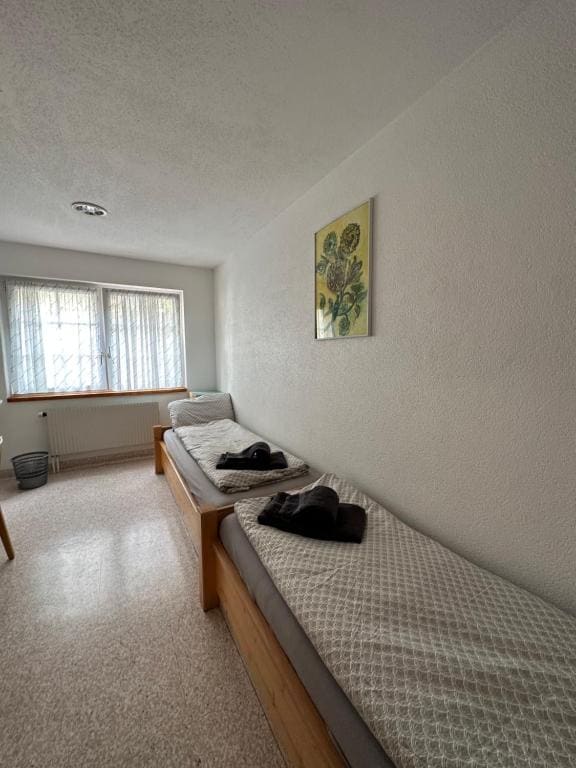 Standard Twin Room with Shared Bathroom room - Image 1