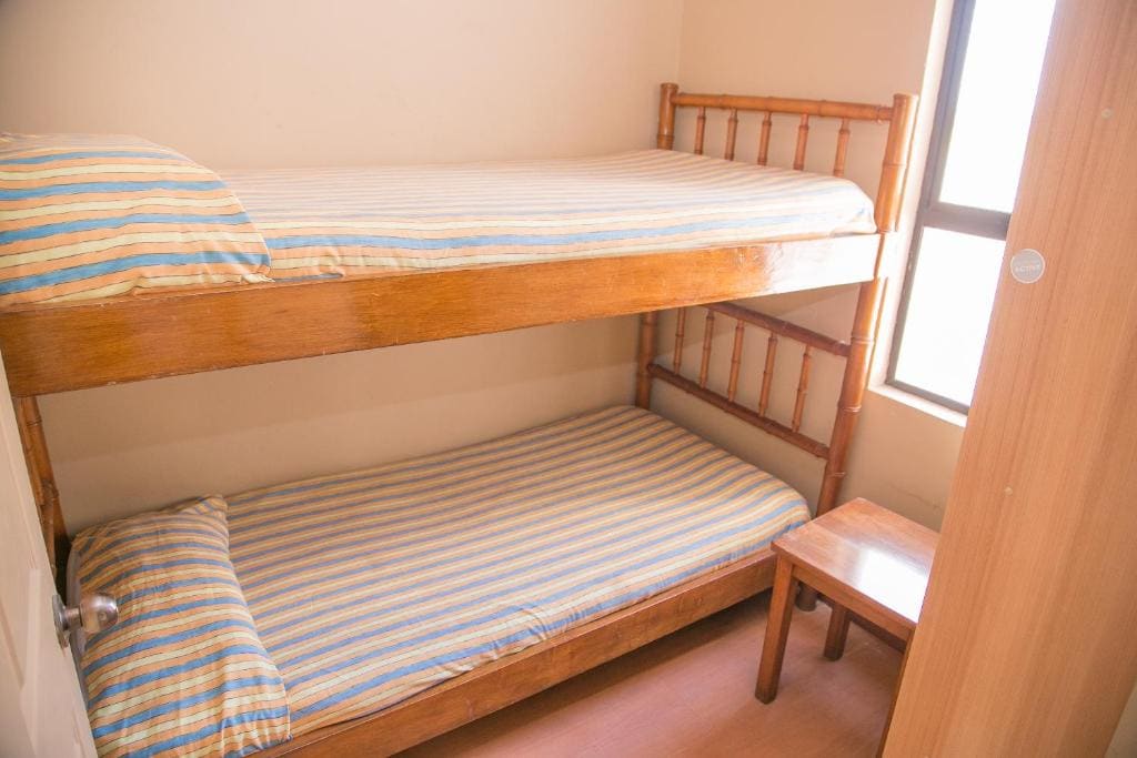 Three-Bedroom Apartment room - Image 2
