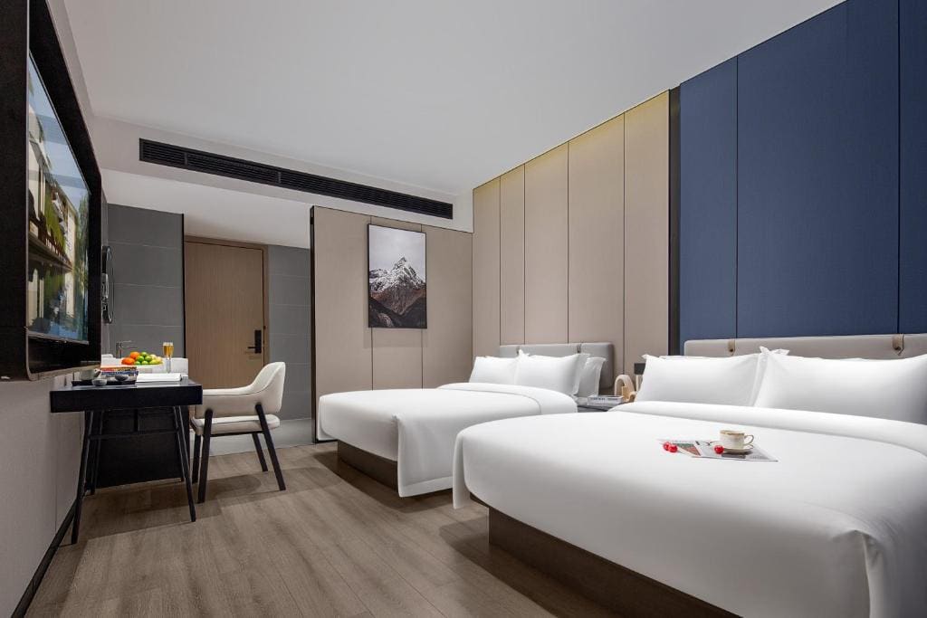 Deluxe Quadruple Room room - Image 2