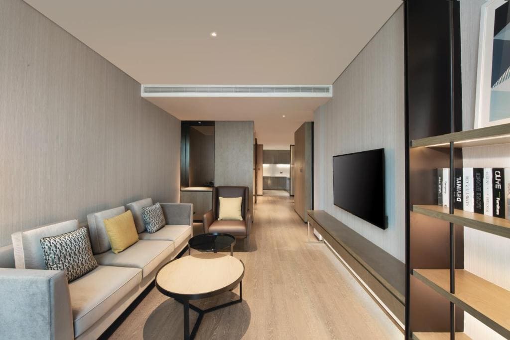 One-Bedroom Family Suite with One King Bed room - Image 1