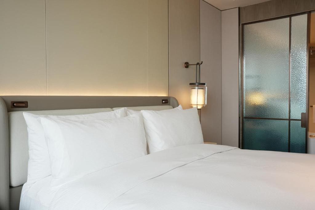 Deluxe King Room with Sofa Bed room - Image 1