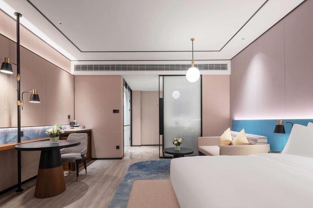 Deluxe King Room with Sofa Bed room - Image 1