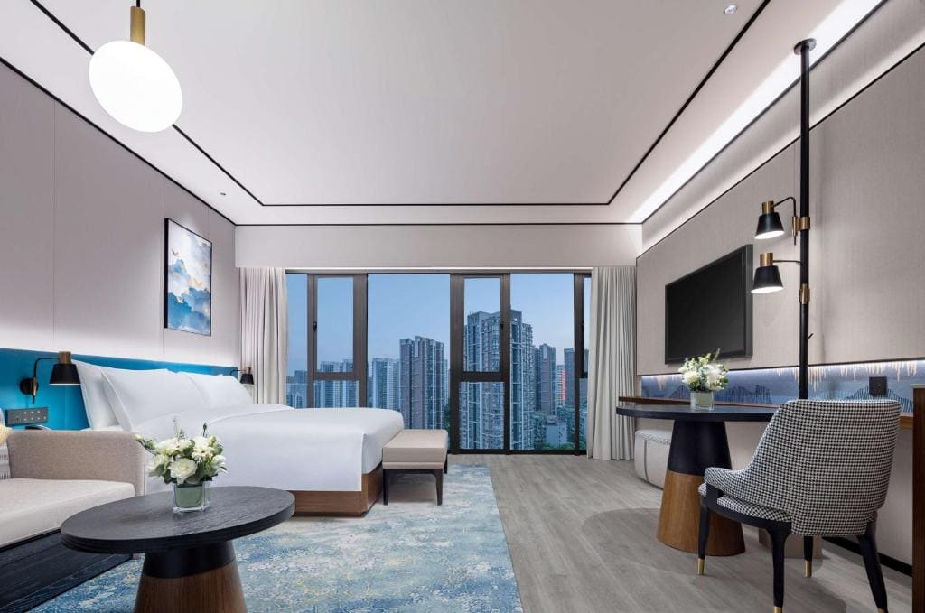 Deluxe King Room with Sofa Bed room - Image 3