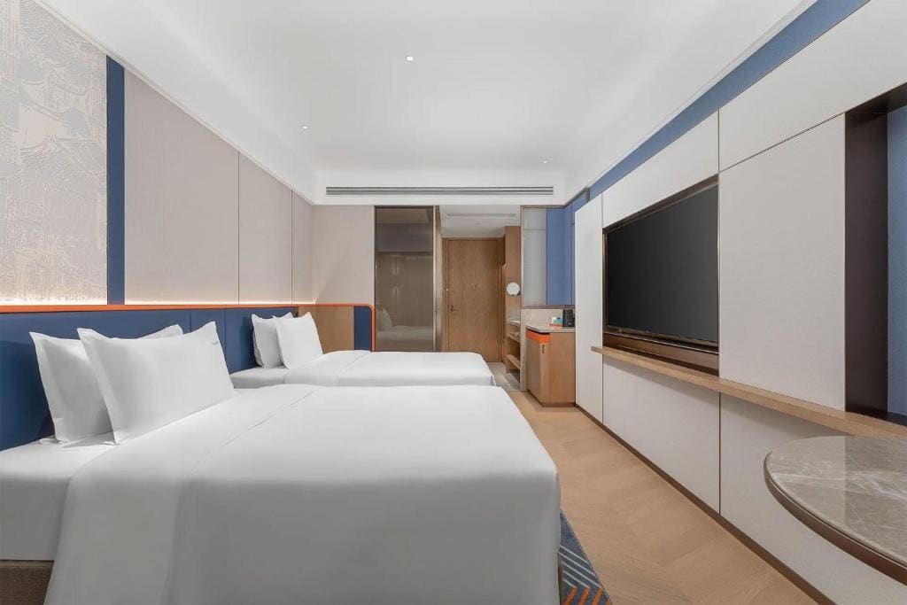 Standard Room with Queen and Double Bed - Extra Floor Space room - Image 1
