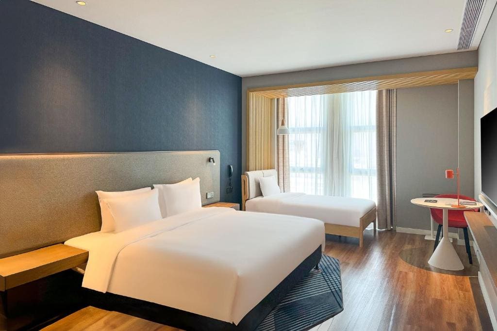 Standard Room with One Double and One King Bed room - Image 1