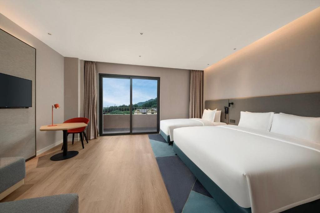 Standard Room with One King, One Single Bed and Balcony room - Image 2