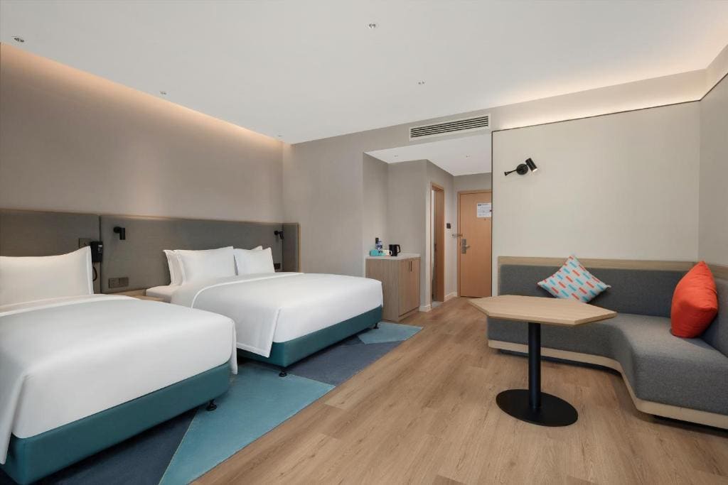 Standard Room with One King, One Single Bed and Balcony room - Image 1