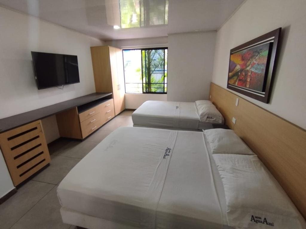 Deluxe Quadruple Room room - Image 2