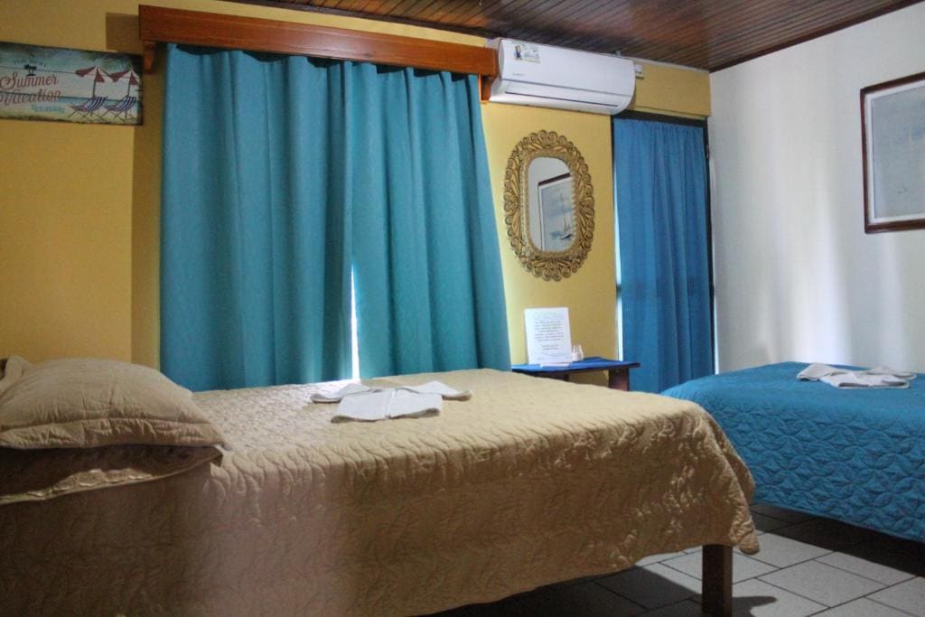 Economy Triple Room with Shared Bathroom room - Image 2