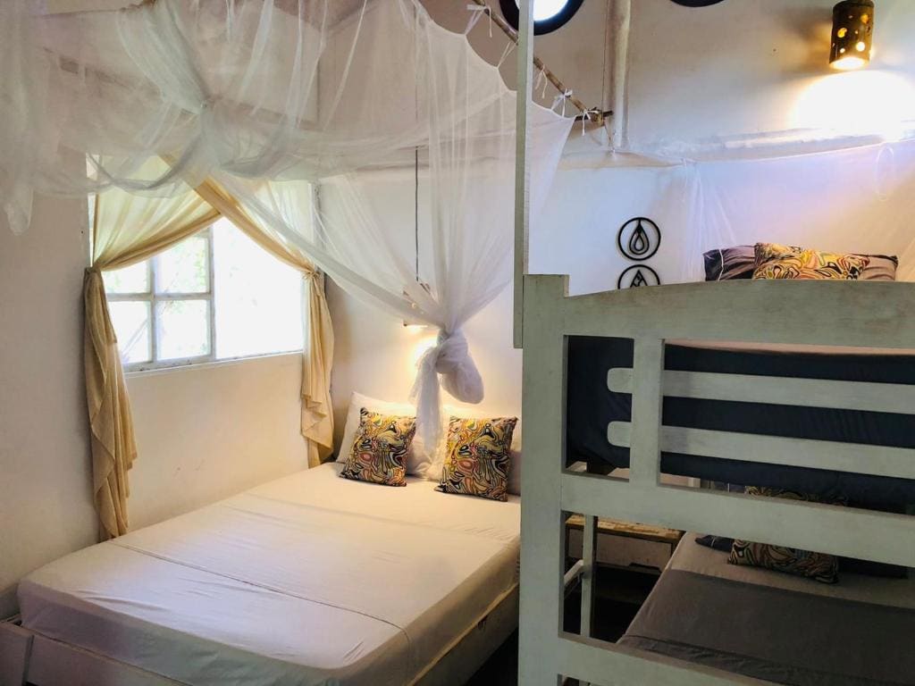 Quadruple Room with Private Bathroom room - Image 1